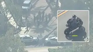 Deputy shot by suspect before dramatic motorcycle chase, officials confirm