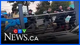 Dramatic encampment arrest caught on camera