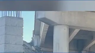 Driver dies when SUV plummets off highway overpass onto pillar