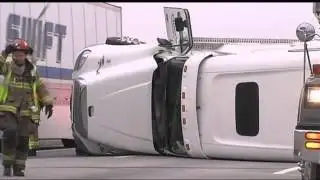 Driver walks away from overturned semi accident
