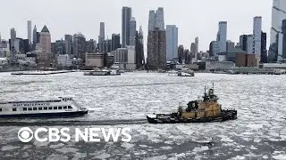 Drone footage shows ice-filled Hudson River as New York grapples with extreme cold