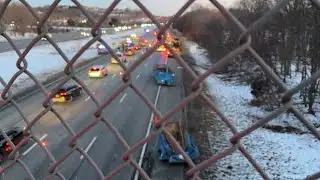 Dumpsters fall off truck on Interstate 95
