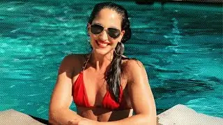 Emily Compagno Stuns Wearing String Bikini in Sunkissed