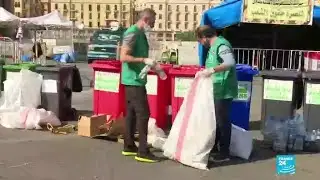 Environmental activists clean up after protesters in Lebanon