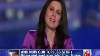 Erin Burnett in Purple Satin Blouse