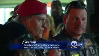 Family and friends pay respects to slain biker