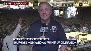 Fans rush into Carver-Hawkeye Arena for team celebration