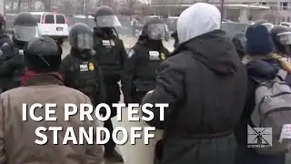 Federal officers confront protesters in Minneapolis