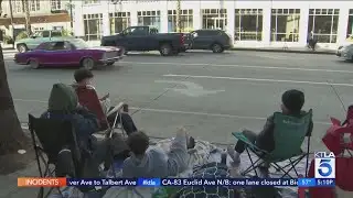 Final preps underway for Rose Parade as paradegoers camp out for good seats