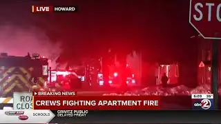 Fire burns in Howard apartment building attic
