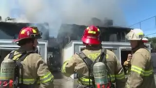 Fire Crews Battle Flames in Hot Temperatures