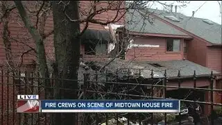 Fire crews battle midtown apartment fire