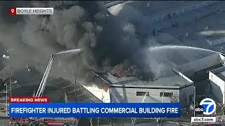 Firefighter injured while battling massive commercial building fire in Boyle Heights