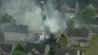 Firefighters battle 2-alarm fire in Laurel