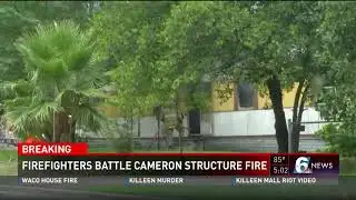 Firefighters battle Cameron structure fire