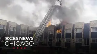 Firefighters battle extra-alarm fire in frigid cold near O