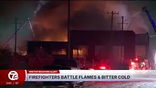 Firefighters battle flames and freezing temperatures in Detroit