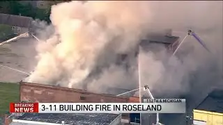 Firefighters battle large Roseland building fire