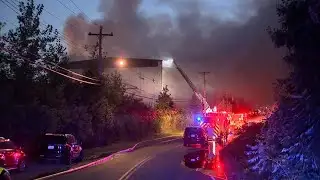 Firefighters expect to battle massive 4-alarm fire through morning