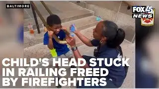 Firefighters free child with head stuck in railing