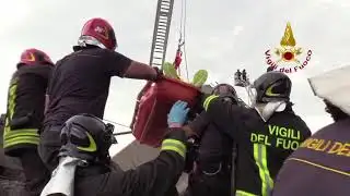 Firefighters Pull Survivors From Genoa Bridge Collapse