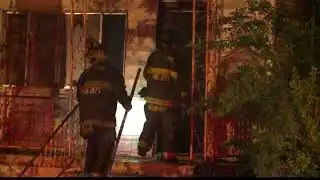 Firefighters put out a house fire