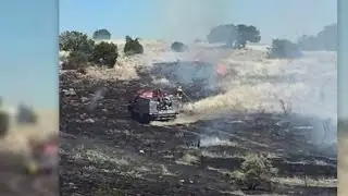 Fireworks spark grass fires along I-40
