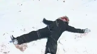 First Alert Meteorologist Courteney Jacobazzi makes a snow angel