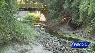 Flood-weary U-City residents fight proposed development