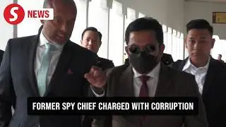 Former intelligence chief charged with graft