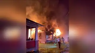 Four people escape house fire