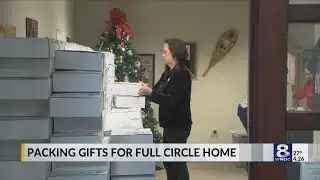 Full Circle Home volunteers pack up gifts from deployed service members