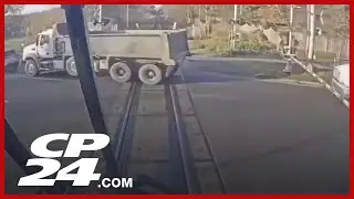 GO Train hits dump truck stopped on tracks