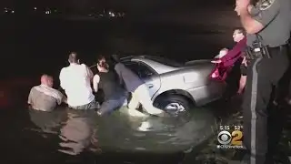 Good Samaritans Help Pull Car From Pond