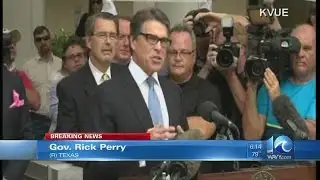 Gov. Rick Perry turns himself in