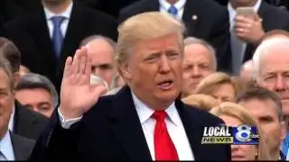 Group holds candlelight vigil after inauguration