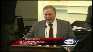 Hassan signs budget compromise into law