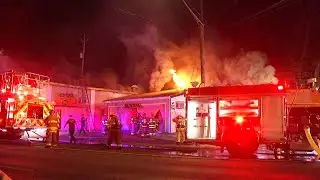 Heavy flames, smoke, damage South Side print shop