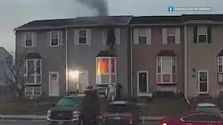 Heroic neighbors save two kids from a burning home
