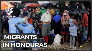Honduras police stop US-bound migrants before Guatemala border
