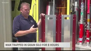 How did they rescue the man from the grain silo?