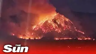 Huge wildfire lights up mountain in Thailand in towering inferno