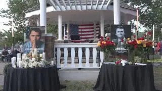 Hundreds gather in Ozark, Mo., for a candlelight vigil for Charlie Kirk