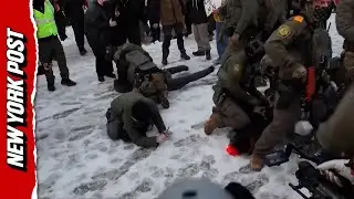 ICE Shooting Sparks Clash With Protesters Outside Minneapolis Court