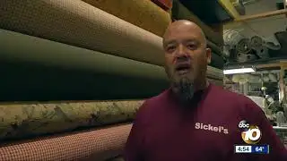 Iconic, 25-foot muffler man gets Christmas swag back