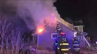 Iowa fire crews battle blaze in sub-zero temperatures