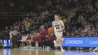 Iowa men hold off USC in tight matchup