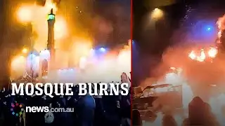 Iran unrest deepens as Tehran mosque goes up in flames