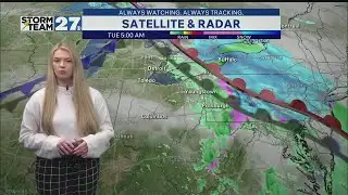 Isolated showers early Tuesday then mostly cloudy skies