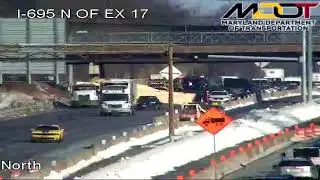 Jackknifed lumber truck blocks I-695 outer-loop near Woodlawn